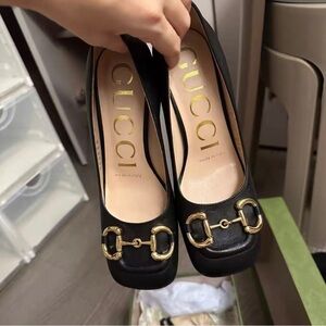 Gucci Black Heels with Gold Detailing
